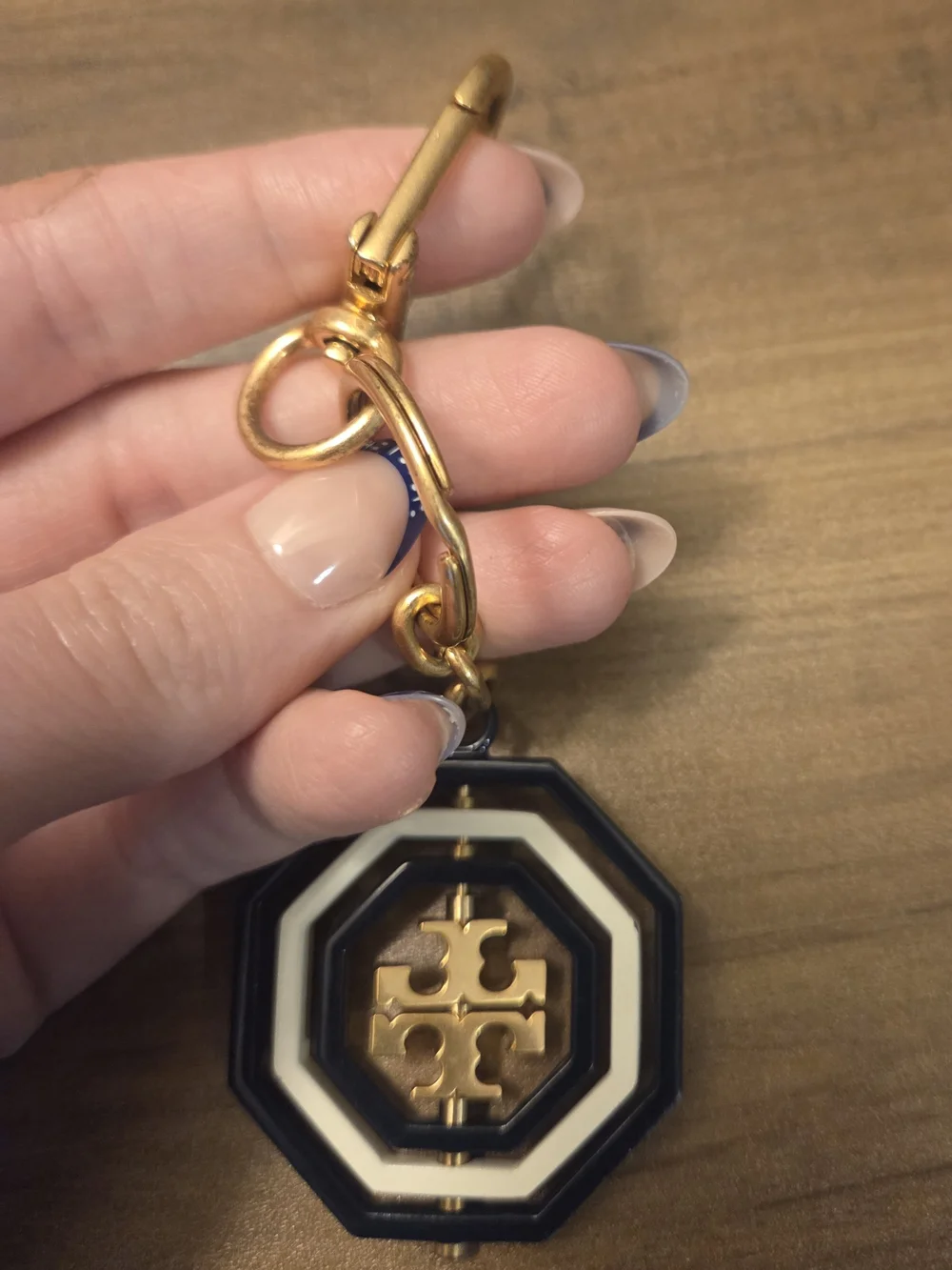 Tory Burch Gold Bag Charm with Navy and Cream Octagon Logo - Picture 3 of 3